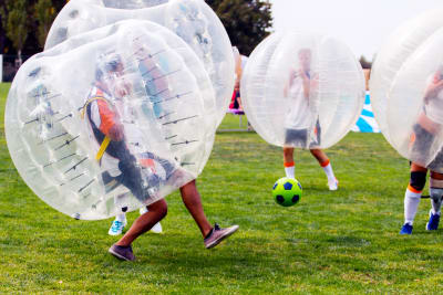 A group playing zorb football