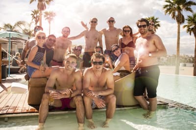group of guys at a beach club