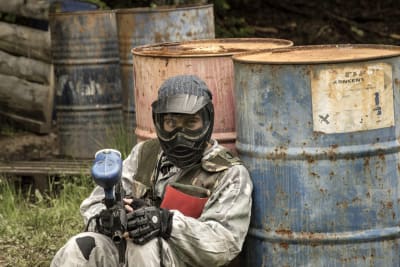 A group of men playing paintball